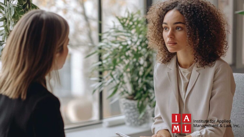 A harassment victim having a private conversation with an HR representative.